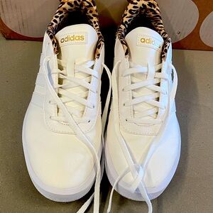 Adidas white sneakers with leopard print accent